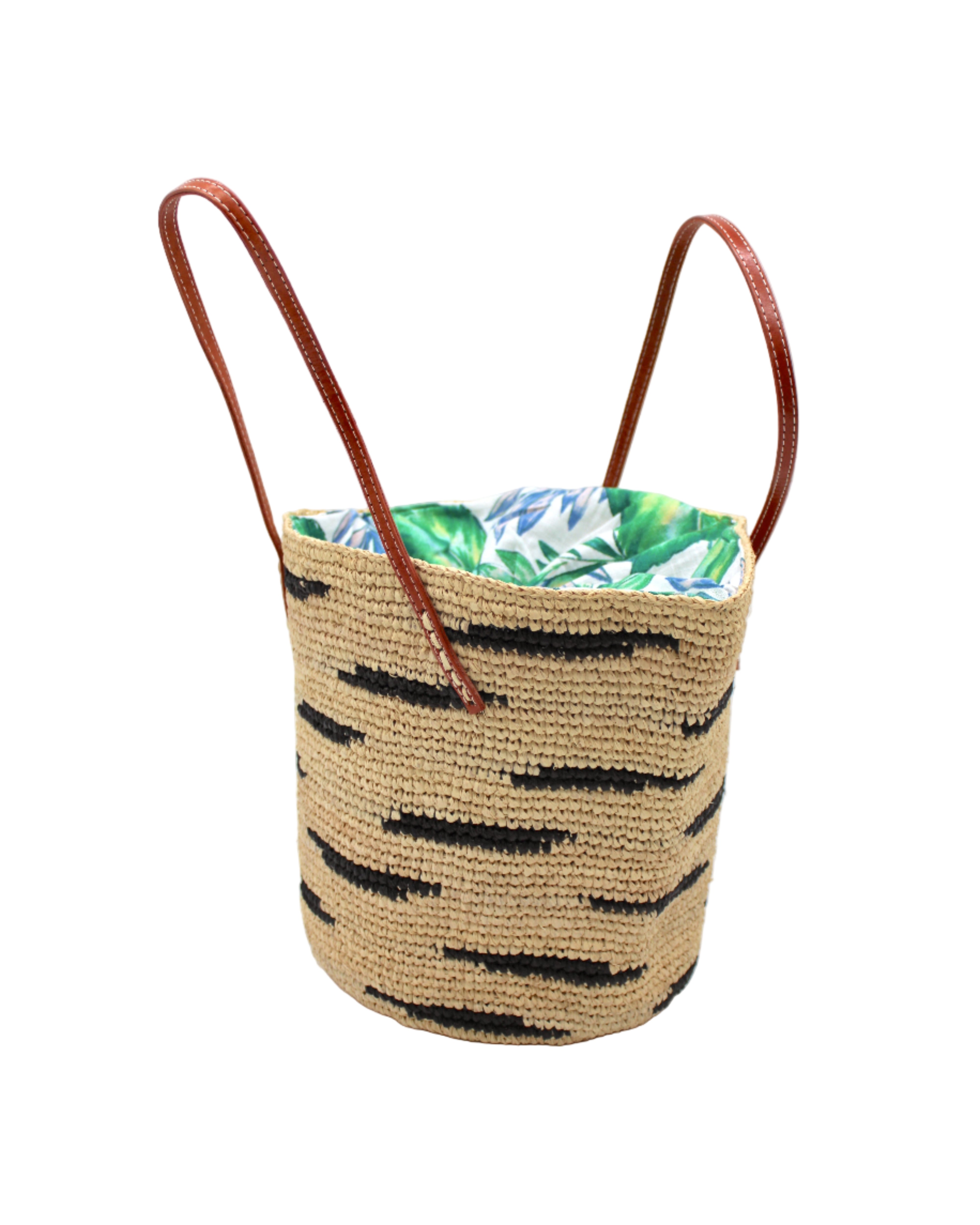 Side view Bimini Crochet Straw Shoulder Bag Purse with Zebra Stripe handmade natural raffia palm fiber in a two tone zebra stripe of primarily Natural straw color with small horizontal asymmetrical bands of Black that create spotted stripe pattern with leather handles handbag beach bag purse - Shebobo