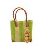 Bora Bora Midori Two Tone Stripes Straw Basket Bag with Waterfall Pompoms Charm Embellishment handmade loomed natural raffia palm fiber in a multicolor horizontal stripe pattern of even width wide bands of midori lime/neon/bright/green and natural straw color with leather handles and feet plus matching waterfall pompom charm embellishment handbag beach bag - Shebobo
