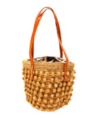 Boucle Cappuccino Crochet Small Straw Handbag  handmade woven raffia palm fiber in a solid hue of cappuccino light/brown/beige in a supple nub/ball texture of horizontal bands around the bag with link weave around the top plus assorted print drawstring liner and leather handles  shoulder bag purse - Shebobo