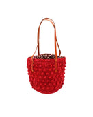 Boucle Red Crochet Small Straw Handbag  handmade woven raffia palm fiber in a solid hue of red in a supple nub/ball texture of horizontal bands around the bag with link weave around the top plus assorted print drawstring liner and leather handles  shoulder bag purse - Shebobo