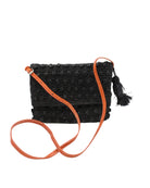 Boucle Black Crochet Straw Crossbody Bag with Tassel Charm  handmade woven raffia palm fiber in a solid hue of black in a supple nub/ball texture of horizontal bands around the bag with link weave around the outer envelope closure flap plus adjustable leather shoulder strap beach bag purse - Shebobo