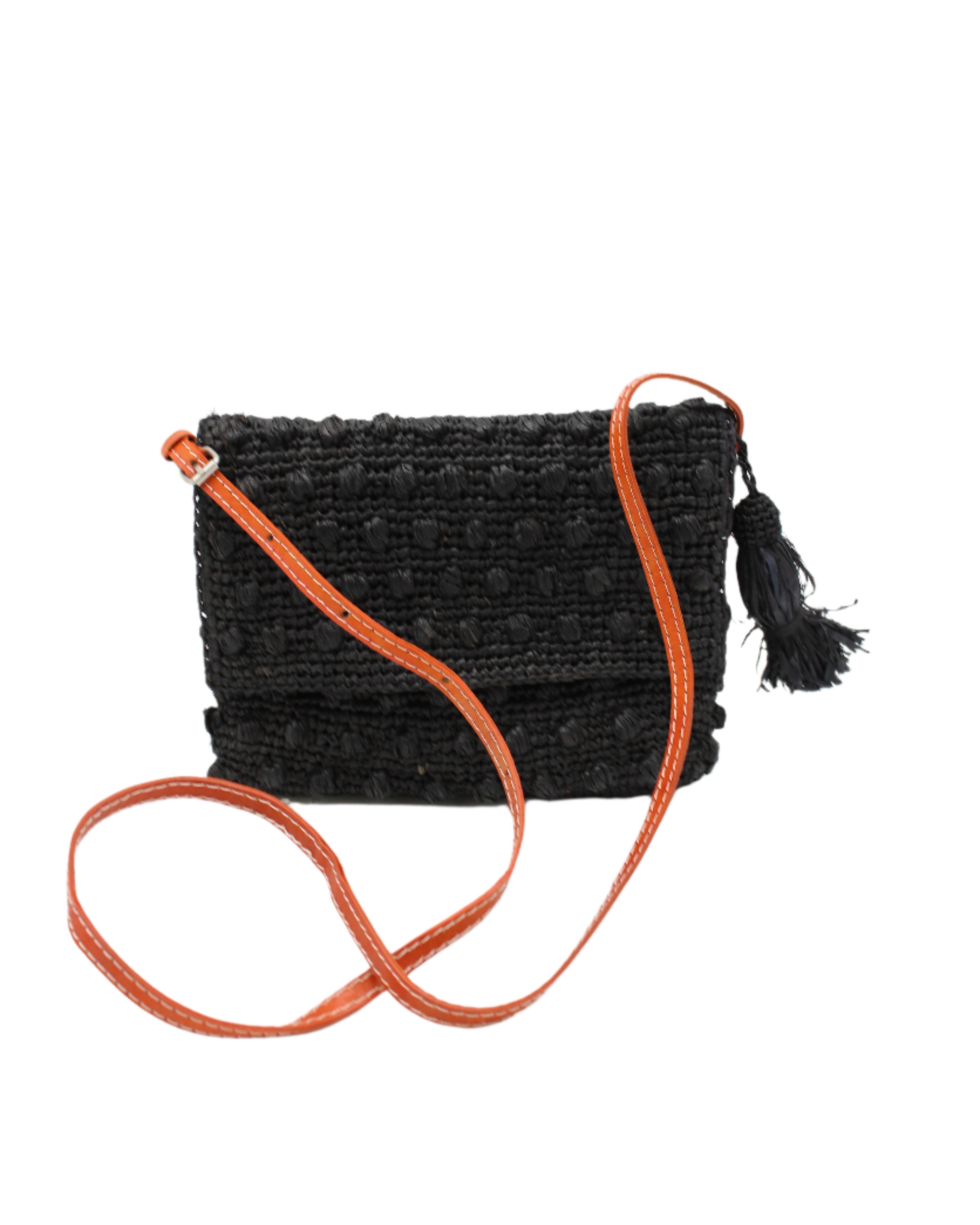 Boucle Black Crochet Straw Crossbody Bag with Tassel Charm  handmade woven raffia palm fiber in a solid hue of black in a supple nub/ball texture of horizontal bands around the bag with link weave around the outer envelope closure flap plus adjustable leather shoulder strap beach bag purse - Shebobo