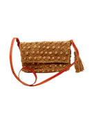 Boucle Cappuccino Crochet Straw Crossbody Bag with Tassel Charm  handmade woven raffia palm fiber in a solid hue of cappuccino light/brown/beige in a supple nub/ball texture of horizontal bands around the bag with link weave around the outer envelope closure flap plus adjustable leather shoulder strap beach bag purse - Shebobo