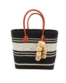 Cabrillo Sisal Basket Bag with Waterfall Pompoms Charm Embellishment handmade natural sisal fiber woven into a multicolor two tone Black and natural straw color  horizontal stripe pattern with muti-width bands of color plus leather handles and natural raffia charm shoulder bag beach bag - Shebobo