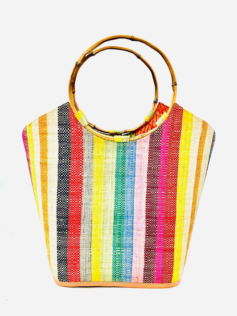 Carmen Solid/Stripes Straw Bucket Bag with Bamboo Handles Lollipop multicolor vertical stripe pattern of natural, orange, black, red, grey, yellow, green, blue, red, and pink with assorted liner purse - Shebobo
