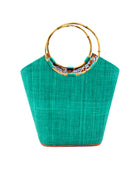 Carmen Teal Straw Bucket Bag with Bamboo Handles handmade loomed raffia in a solid hue of teal blue/green with assorted African print fabric liner handbag - Shebobo