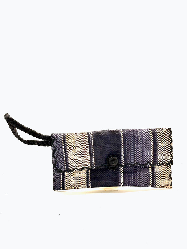 ChiChi Black Swirl Multicolor Straw Clutch Bag handmade loomed raffia palm fiber wristlet in multi-width bands of black, grey, and natural that create a vertical stripe pattern with black color cross stitch edging, button & loop closure, and braided wrist strap - Shebobo