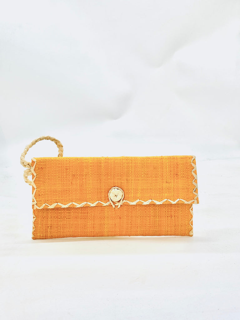 ChiChi Saffron Straw Clutch Bag handmade loomed raffia palm fiber wristlet in saffron yellow color with natural straw color cross stitch edging, button & loop closure, and braided wrist strap - Shebobo