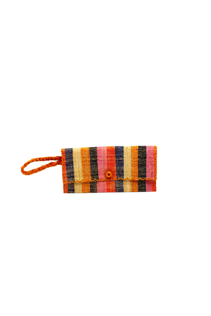 ChiChi Candyland Stripe Multicolor Straw Clutch Bag handmade loomed raffia palm fiber wristlet in even-width bands of orange, saffron yellow, pink, black, navy blue, and natural straw color that create a vertical stripe pattern with orange color cross stitch edging, button & loop closure, and braided wrist strap - Shebobo