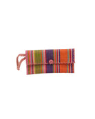 ChiChi Raspberry Swirl Multicolor Straw Clutch Bag handmade loomed raffia palm fiber wristlet in multi-width bands of light blue, light/baby pink, saffron orange/yellow, red, lime green, natural straw color, dark blue, and fuchsia pink that create a vertical stripe pattern with red color cross stitch edging, button & loop closure, and braided wrist strap - Shebobo