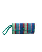 ChiChi Teal Swirl Multicolor Straw Clutch Bag handmade loomed raffia palm fiber wristlet in multi-width bands of teal dark/blue/green, seafoam light/blue/green, navy dark blue, red, and fuchsia pink that create a vertical stripe pattern with teal color cross stitch edging, button & loop closure, and braided wrist strap - Shebobo
