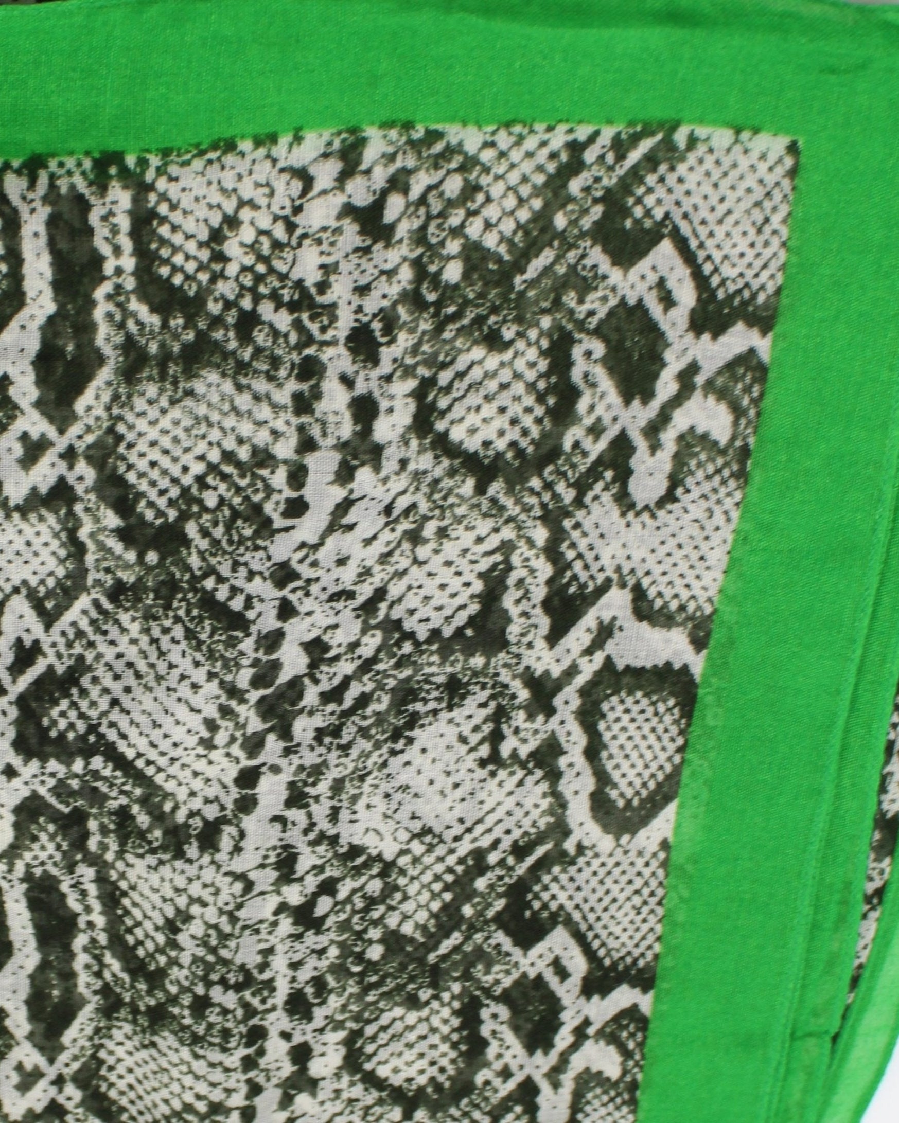 Detail view of pattern Cleo Snake Print Scarf Wrap  Kelly Green, Black, and White Multicolor Snake Skin Patterned Scarf with colored edge  - Shebobo