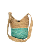Coronado Two Tone Crochet Crossbody Bag handmade with interior liner, horn button and loop closure raffia purse seafoam/light turquoise greenish blue/teal bottom, with narrow natural straw color horizontal stripe separating light brown/tea colored top & shoulder strap - Shebobo