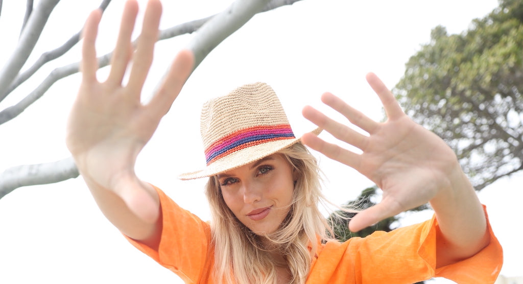 Shebobo Black Friday, Thanksgiving, & Cyber Monday Sale 30% OFF because we're Thankful for our customers. Model wearing Crochet Fedora Straw Sun Hat Multicolor Hat Band and Natural Raffia Palm Hat - Shebobo