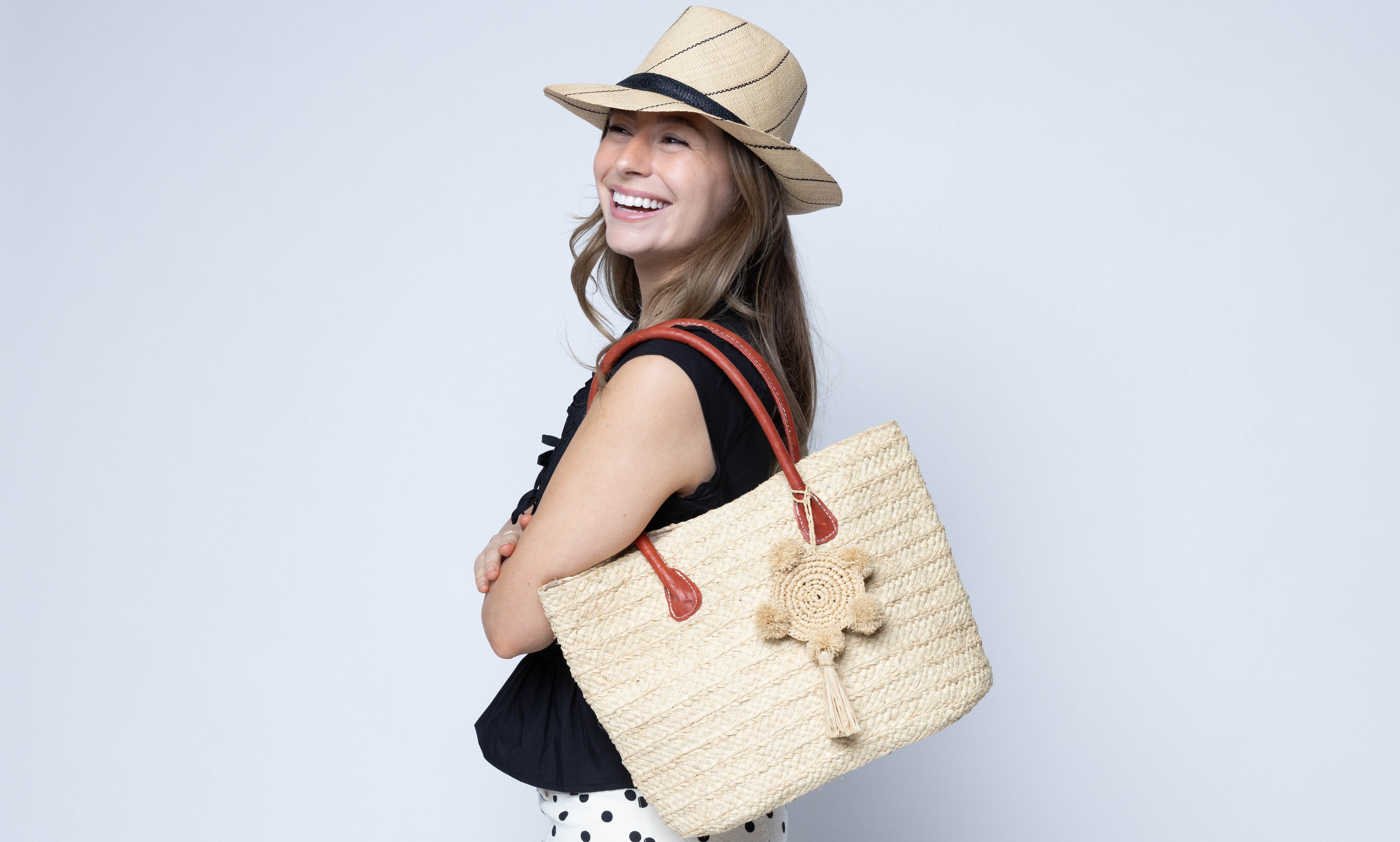 Nomena Braided Straw Basket Handbag handmade braided natural raffia palm fiber in a solid hue of natural straw color woven into concentric horizontal bands of subtle texture spiraling around the bag with leather handles beach bag shoulder bag purse - Shebobo (with Fedra 2" Brim Fedora Unisex Straw Hats)