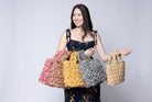 Model wearing Florence Flower Crochet Raffia Straw Basket Handbag in multiple color options - Shebobo