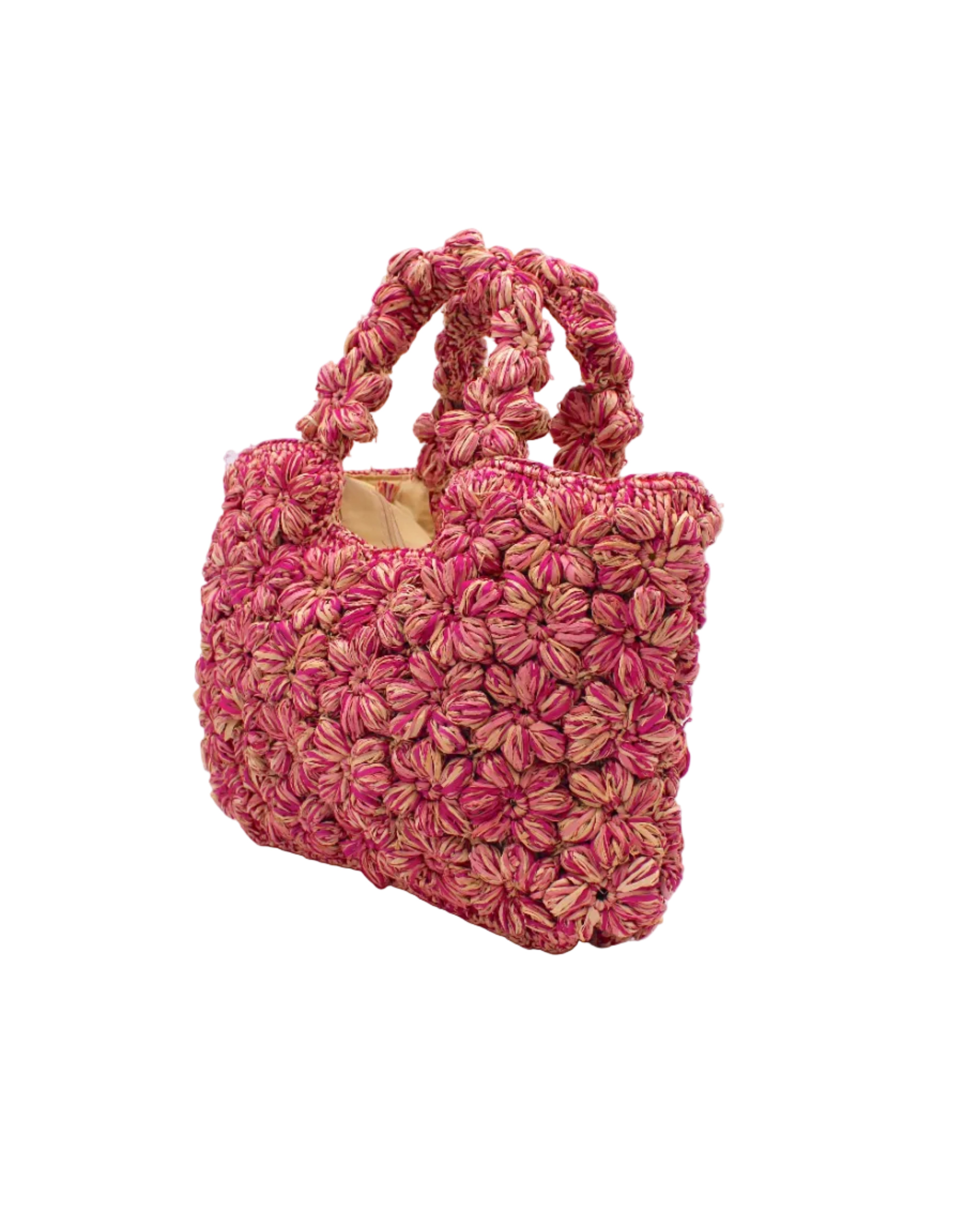 Side view Florence Fuchsia Pinks Multicolor Flower Crochet Straw Basket Handbag handmade natural raffia palm fiber in a multicolor hue combination of natural straw color, fuchsia hot/bright/pink, and light pink with subtle tied flower design consisting of 88 flowers crochet together along the outside of the bag as well as the handles purse tote - Shebobo
