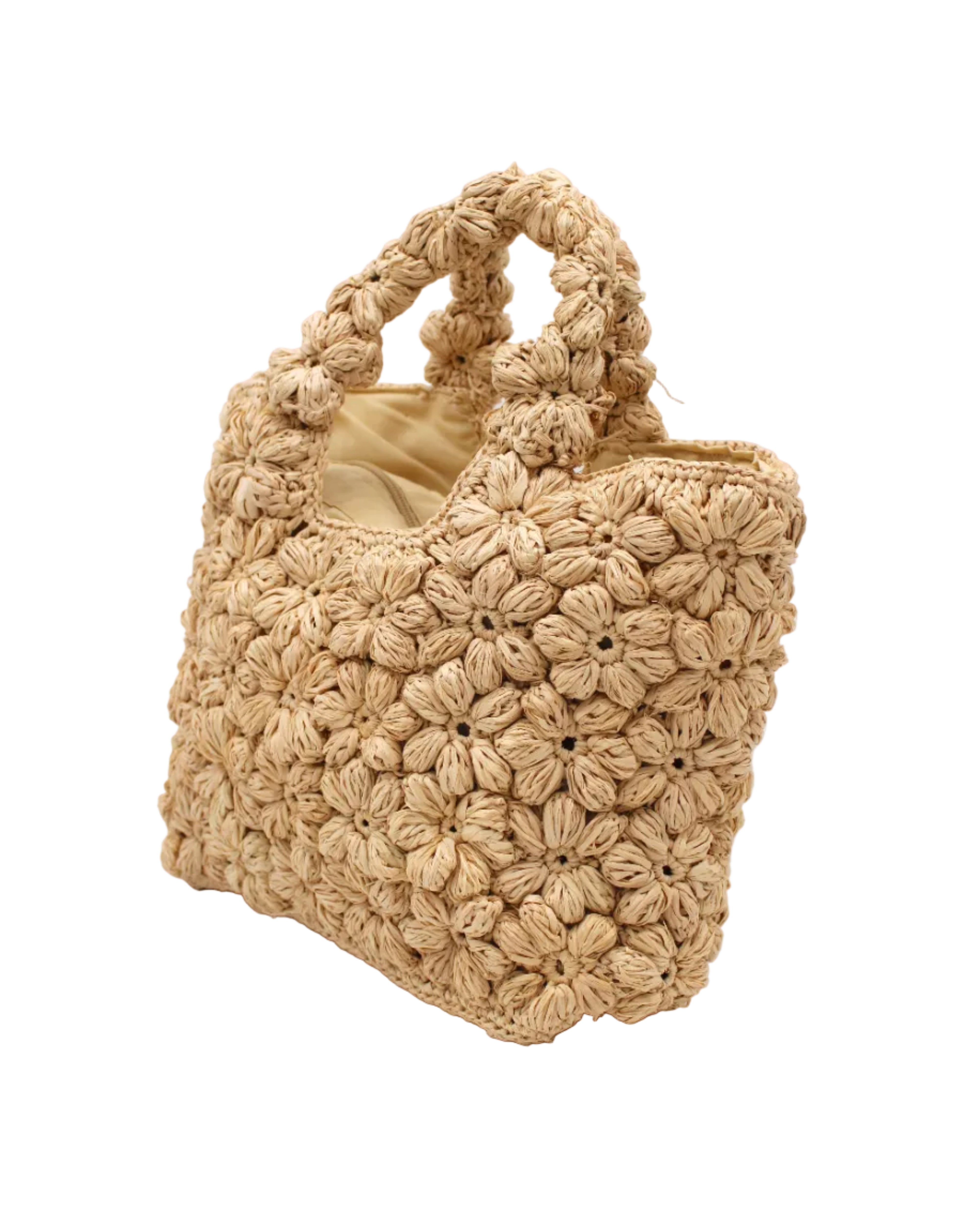 Side view Florence Flower Crochet Straw Basket Handbag handmade natural raffia palm fiber in a solid hue of natural straw color with subtle tied flower design consisting of 88 flowers crochet together along the outside of the bag as well as the handles purse tote - Shebobo