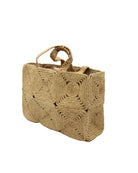 Side view Gemma Crochet Disc Rectangle Large Straw Basket Handbag handmade braided natural raffia palm fiber in a solid hue of Natural straw color with subtle square disc pattern around the outside of the bag in two horizontal bands of squares creating a geometric pattern and matching woven handles beach bag purse - Shebobo