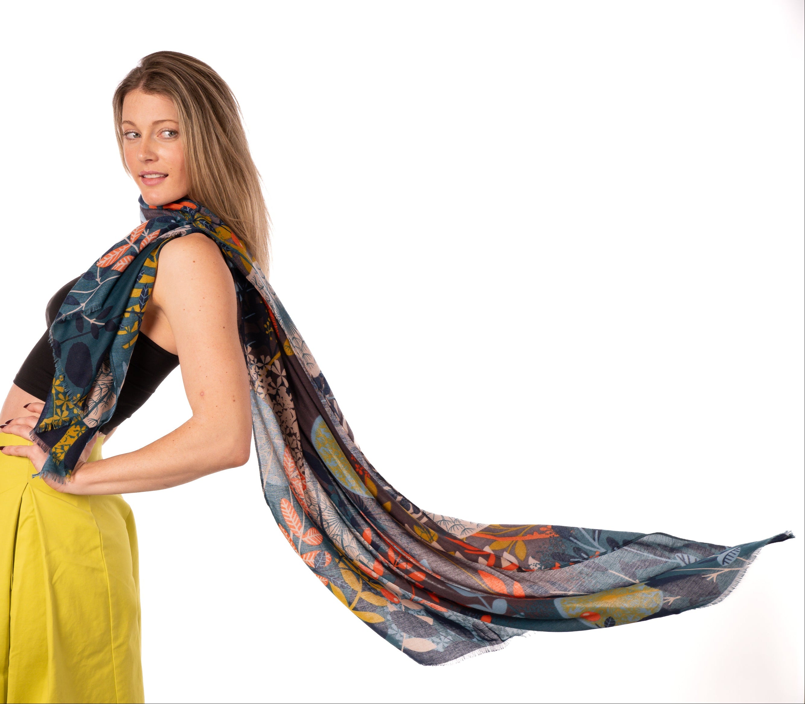 Model wearing Tropical Forest Scarf Wrap Grey & Teal Multicolor leaves and floral pattern with grey, orange, blue, teal, beige, yellow, etc. - Shebobo
