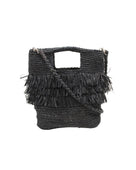 Hana Mini ConCon Crochet Petite Raffia Straw Basket Handbag Convertible Crossbody Bag with Fringe Purse handmade raffia palm fiber in a solid hue of black in a subtle band crochet link texture with horizontal multi tired layers of fringe around the center third of the bag with matching detachable crossbody strap - Shebobo