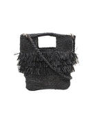 Hana Mini ConCon Crochet Petite Raffia Straw Basket Handbag Convertible Crossbody Bag with Fringe Purse handmade raffia palm fiber in a solid hue of black in a subtle band crochet link texture with horizontal multi tired layers of fringe around the center third of the bag with matching detachable crossbody strap - Shebobo