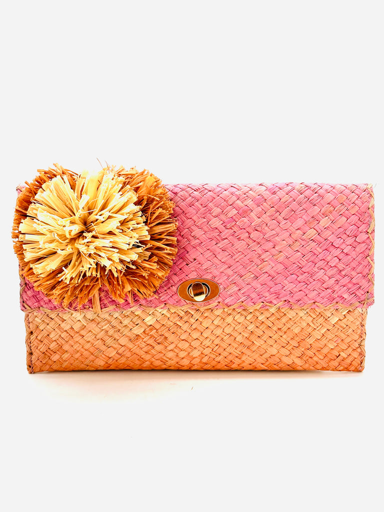 Holden Ombre Blush Straw Clutch with Flower Pouf handmade woven raffia dip dyed gradient of lavender purple/pink, natural, and blush orange/pink with large blush and natural fringe flower embellishment - Shebobo