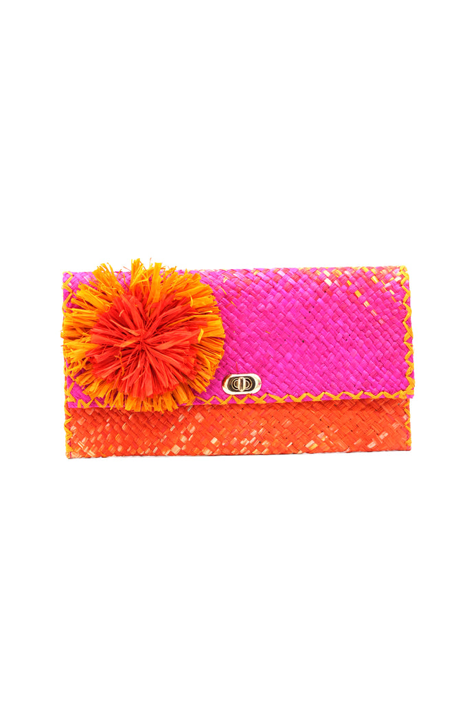 Holden Ombre Fuchsia Straw Clutch with Flower Pouf handmade woven raffia dip dyed gradient of fuchsia bright/barbie/pink, saffron yellow, and coral orange/red with large coral and fuchsia fringe flower embellishment - Shebobo