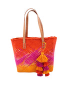 Holden Ombre Fuchsia Straw Handbag Tassel Charm Embellishment handmade woven raffia dip dyed gradient of coral orange/red, fuchsia bright pink, and saffron yellow with matching multicolored, multi-tiered raffia tuft tassel - Shebobo