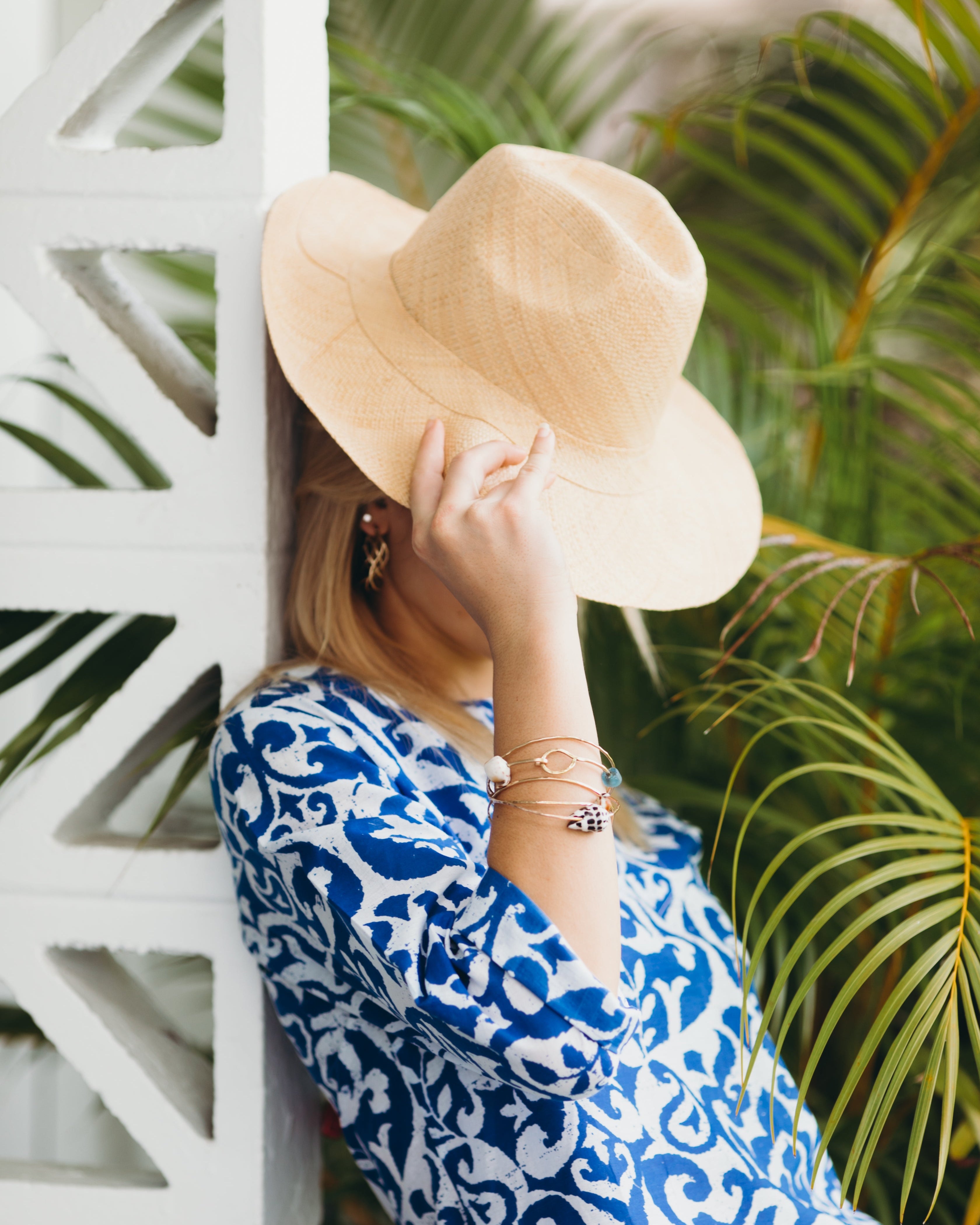 Model wearing Jamie Panama Natural unisex straw hat handmade loomed raffia 3" brim sun hat - Shebobo