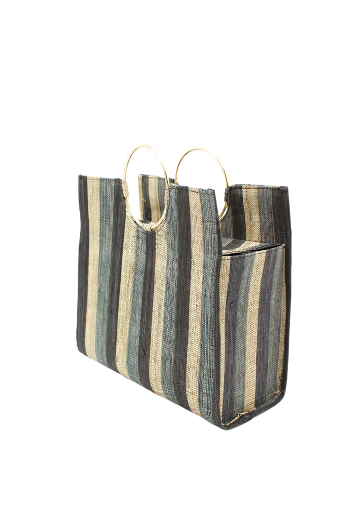 Side View JoJo Woven Straw Handbag with Metal Ring Handle handmade natural raffia palm fiber in a stripe pattern of natural straw color, grey, and black with matching woven thread texture and metallic circular metal ring handle - Shebobo