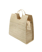 Side view JoJo Woven Straw Handbag with Metal Ring Handle handmade natural raffia palm fiber in a solid hue of natural straw color with matching woven thread texture and metallic circular metal ring handle - Shebobo