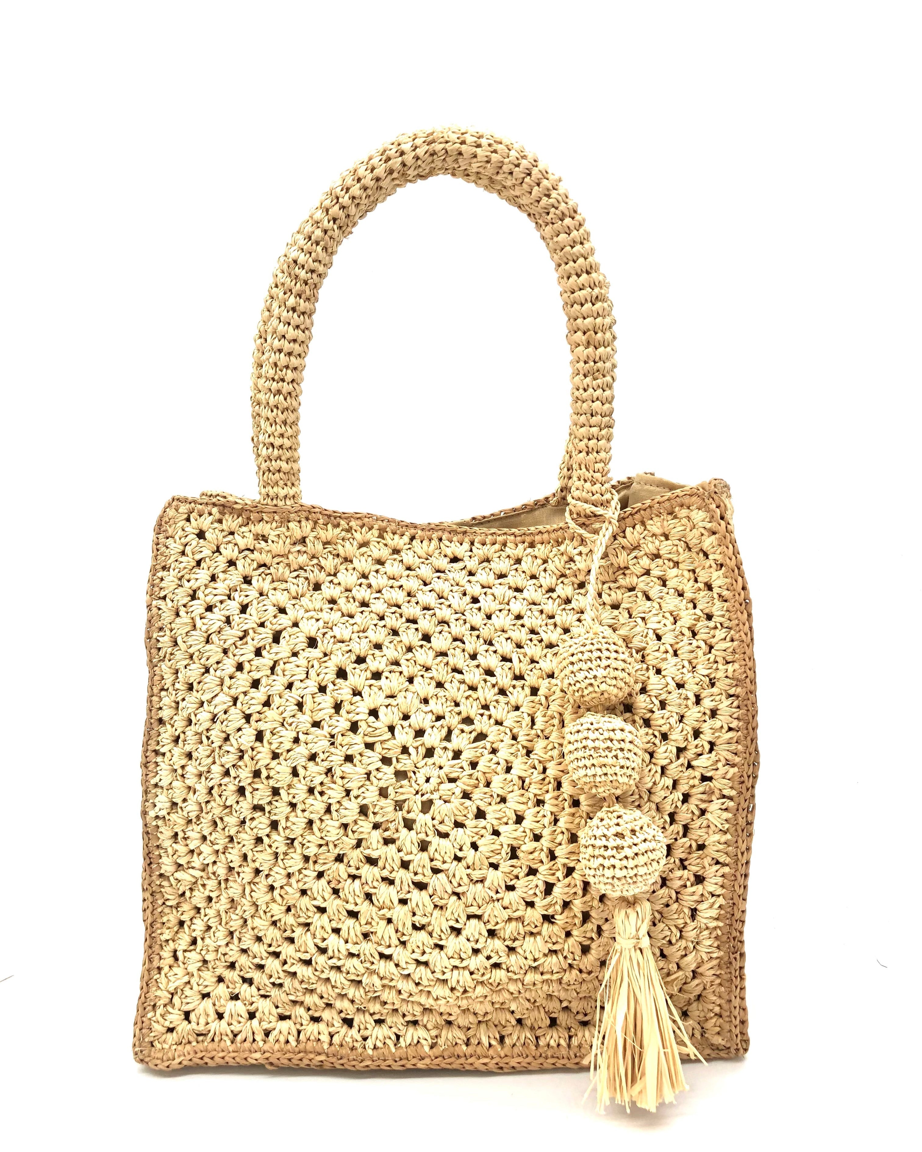 Kimba Crochet Handbag with Sphere Tassel Charm Embellishment handmade natural raffia palm fibers crochet into a granny square pattern with cappuccino/light brown detail edging - Shebobo