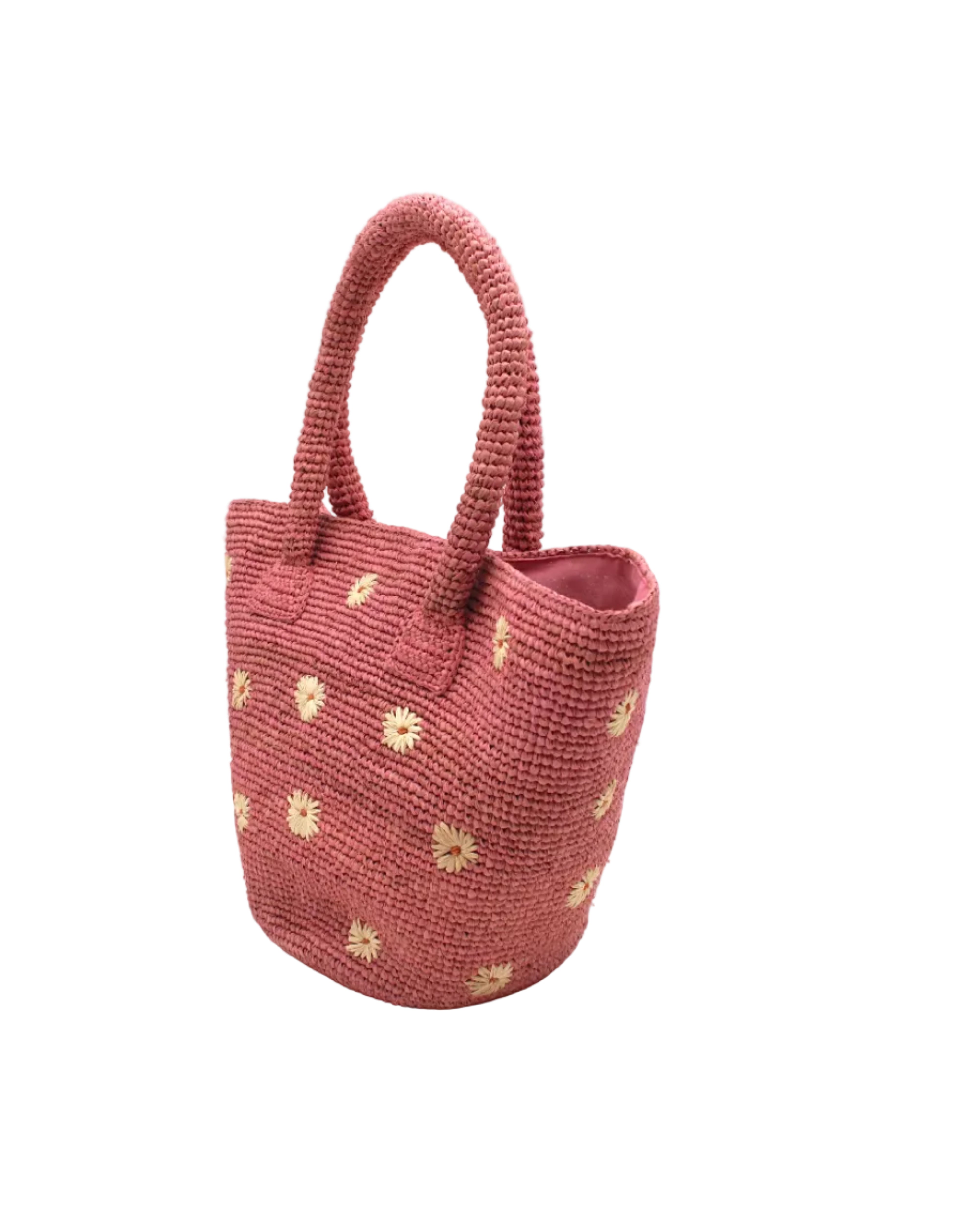 Side view Kirra Daisy Flowers Crochet Straw Basket Handbag handmade crochet raffia palm fiber in a solid hue of light pink with embroidered round natural straw color  petals and blush pink/orange inner dot flower pattern purse with matching crochet handles beach bag purse tote - Shebobo