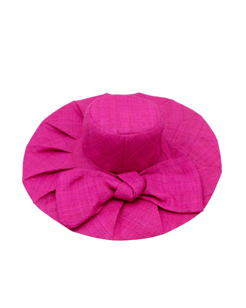 Lilly 5" Brim Fan Straw Sun Hat with Big Bow Fuchsia handmade loomed natural raffia palm fiber in a solid hue of Fuchsia hot/bright/barbie/pink with pleated wide brim and oversized bow embellishment - Shebobo