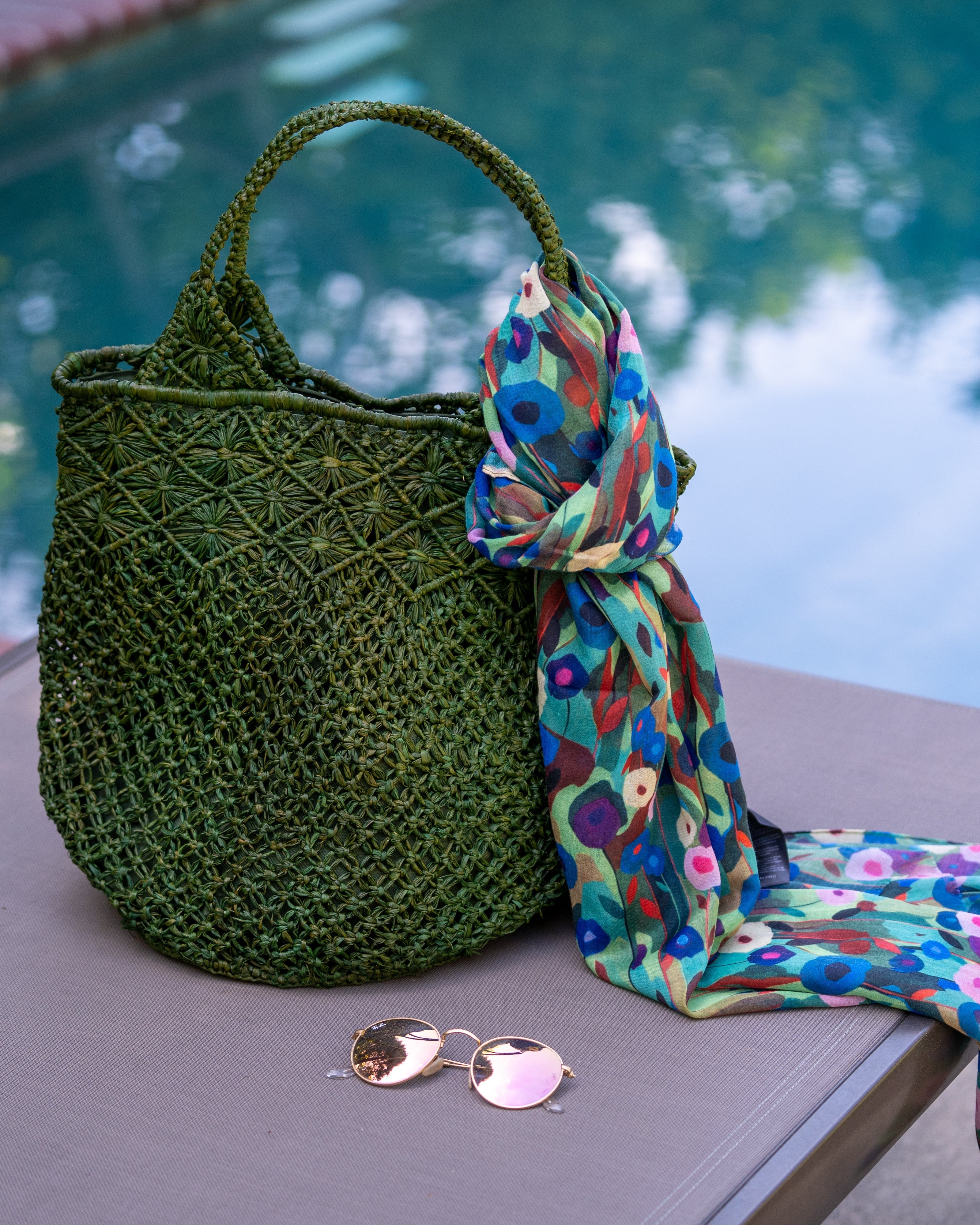 Luca Macrame Diamonds Crochet Straw Handbag handmade knotted natural raffia palm fiber in a solid hue of Deep Green forest/army/dark/green in a multi-texture circular pattern of concentric spiral links on the base, cross-hatch x pattern up 2/3rds of the bag, and geometric diamond flower pattern around the top third, with diamond pattern on the base of the shoulder strap handles with tubular loop handle tops - Shebobo (with Poppy Dreams Scarf Wrap)