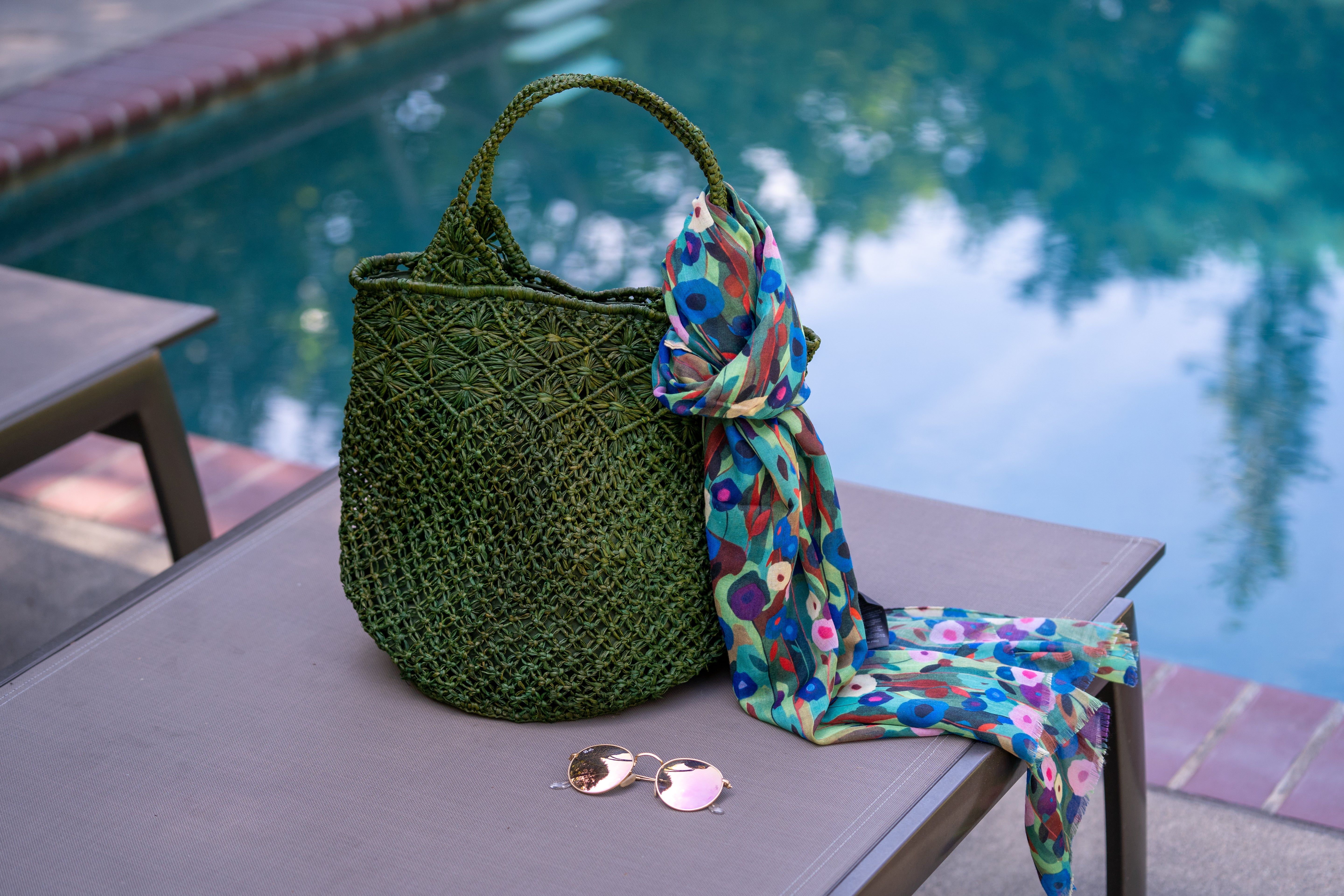 Luca Macrame Diamonds Crochet Straw Handbag handmade knotted natural raffia palm fiber in a solid hue of Deep Green forest/army/dark/green in a multi-texture circular pattern of concentric spiral links on the base, cross-hatch x pattern up 2/3rds of the bag, and geometric diamond flower pattern around the top third, with diamond pattern on the base of the shoulder strap handles with tubular loop handle tops - Shebobo (with Poppy Dreams Scarf Wrap)