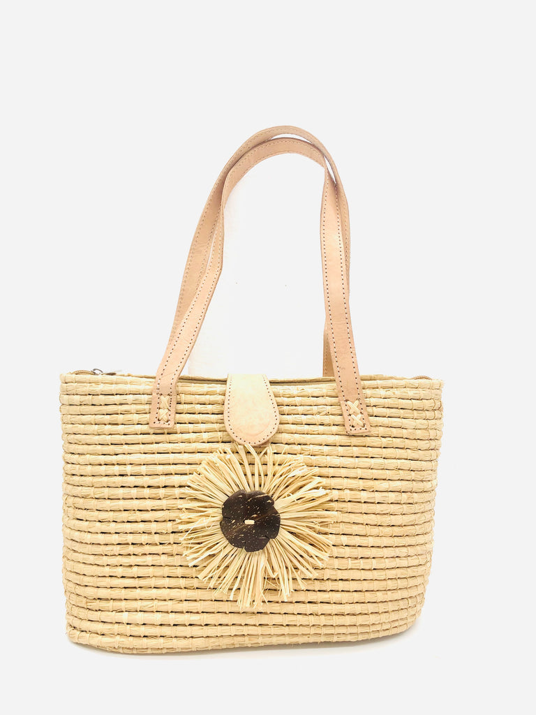 Lucy Straw Handbag with Flower Detail handmade crochet natural raffia purse with brushed fringe and carved coconut button flower embellishment and leather handles - Shebobo
