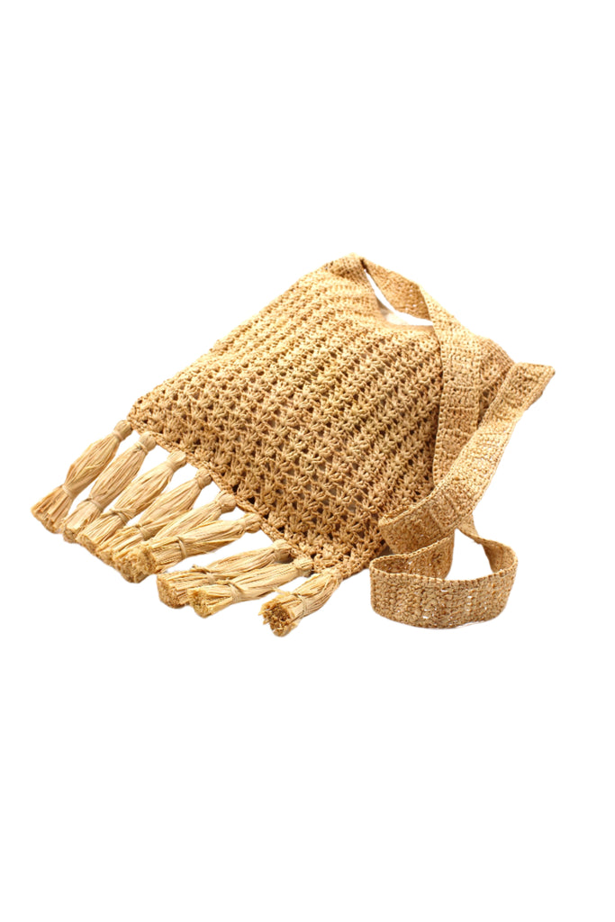 Luli Crochet Natural Straw Crossbody Bag with Multiple Tassel Trim handmade natural raffia palm fiber in a solid hue of natural straw color with supple knotted texture and full fabric liner plus crochet strap and fringed tassel embellishment purse shoulder bag - Shebobo