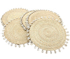 Makena Round Crochet Natural Raffia Straw Placemats handmade woven raffia palm fiber in a solid hue of natural straw color with coiled loop texture discs with cowrie shell edge embellishment set of six - Shebobo