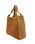 Side view Mamie Zigzag Pinstripe XL Crochet Straw Basket Handbag handmade crochet natural raffia palm fiber in a solid hue of tobacco dark/cinnamon/brown purse beach bag with contrasting natural straw color zigzag pinstripe pattern on the sides of the bag and matching outer edge - Shebobo