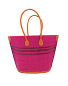 Marina Racing Stripe Small Straw Tote Bag handmade loomed natural raffia palm fiber in a solid hue of Fuchsia hot/bright/barbie/pink with three horizontal bands of umberwine burgundy/dark/red/purple making a pinstripe pattern across the top third of the bag with matching cross-stitch edging, leather handles and accents beach bag handbag - Shebobo 