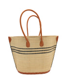 Marina Racing Stripe Small Straw Tote Bag handmade loomed natural raffia palm fiber in a solid hue of natural straw color with three horizontal bands of black making a pinstripe pattern across the top third of the bag with matching cross-stitch edging, leather handles and accents beach bag handbag - Shebobo 