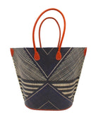 Mariposa Large Straw Tote Bag handmade loomed natural raffia palm fiber in a multi paneled pattern design of pinstripe, melange, and wide stripe combinations geometrically radiating from the center point of the bag outwards in a two tone color combination of Black and natural straw color with a solid hue of color on the back of the bag plus leather handles and embellishments shoulder bag - Shebobo