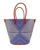 Mariposa Large Straw Tote Bag handmade loomed natural raffia palm fiber in a multi paneled pattern design of pinstripe, melange, and wide stripe combinations geometrically radiating from the center point of the bag outwards in a two tone color combination of Denim retro/light/blue and natural straw color with a solid hue of color on the back of the bag plus leather handles and embellishments shoulder bag - Shebobo