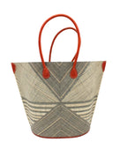 Mariposa Large Straw Tote Bag handmade loomed natural raffia palm fiber in a multi paneled pattern design of pinstripe, melange, and wide stripe combinations geometrically radiating from the center point of the bag outwards in a two tone color combination of Grey and natural straw color with a solid hue of color on the back of the bag plus leather handles and embellishments shoulder bag - Shebobo