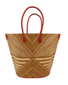 Mariposa Large Straw Tote Bag handmade loomed natural raffia palm fiber in a multi paneled pattern design of pinstripe, melange, and wide stripe combinations geometrically radiating from the center point of the bag outwards in a two tone color combination of Tobacco cinnamon/dark/brown and natural straw color with a solid hue of color on the back of the bag plus leather handles and embellishments shoulder bag - Shebobo