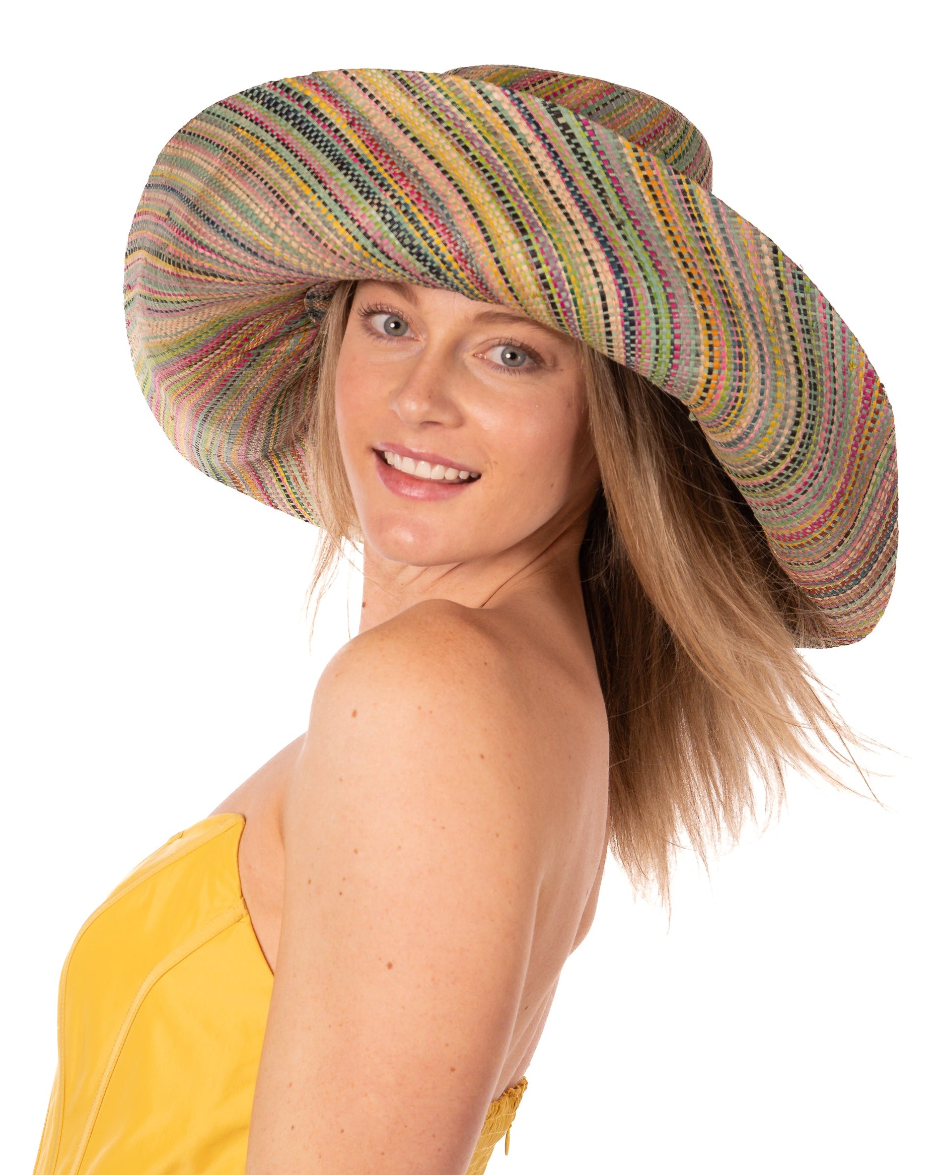Model wearing Monica 7" Wide Brim Seafoam Multi Melange Packable Straw Sun Hat multicolor heather pattern of seafoam blue/green, lime green, turquoise blue, yellow, navy blue, pink, fuchsia, coral orange/red, natural straw color, etc. - Shebobo