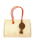 Monte Carlo Big Straw Beach Bag with Dreamcatcher Tassel Charm Embellishment handmade loomed raffia palm fiber in a solid hue of natural straw color with contrasting crosshatch stitch edging in cinnamon/tobacco/dark/brown with matching crochet dreamcatcher disc and tuft tassel charm embellishment and leather handles oversized large handbag shoulder bag - Shebobo
