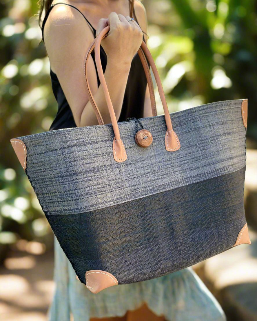 Monterey Two Tone Straw Tote Bag handmade loomed raffia fibers in a color block pattern of grey colored upper half, and black lower half - Shebobo
